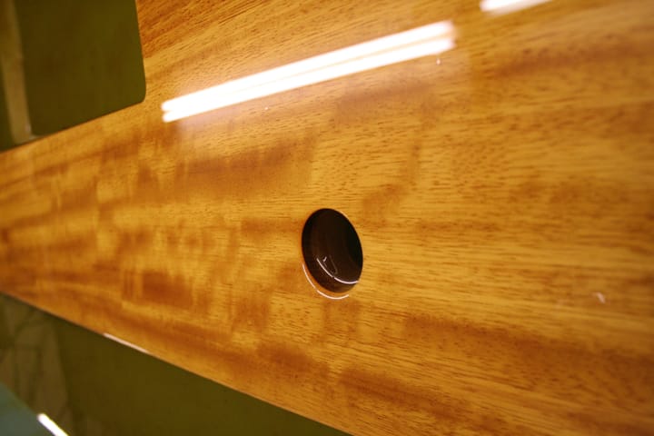 Tap hole detail in a glossy oiled iroko worktop