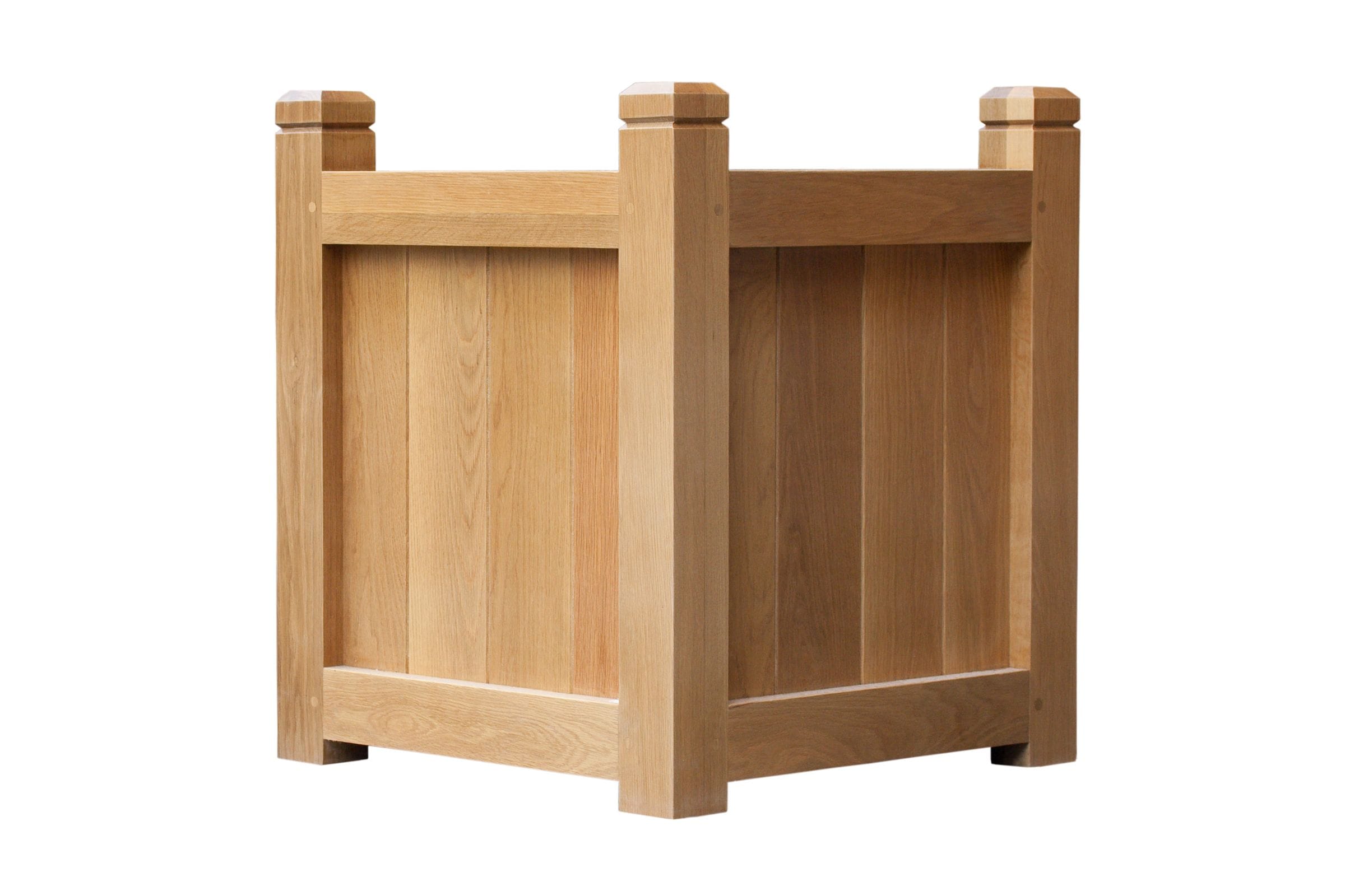 Square oak garden planter with panelled sides and capped corner posts