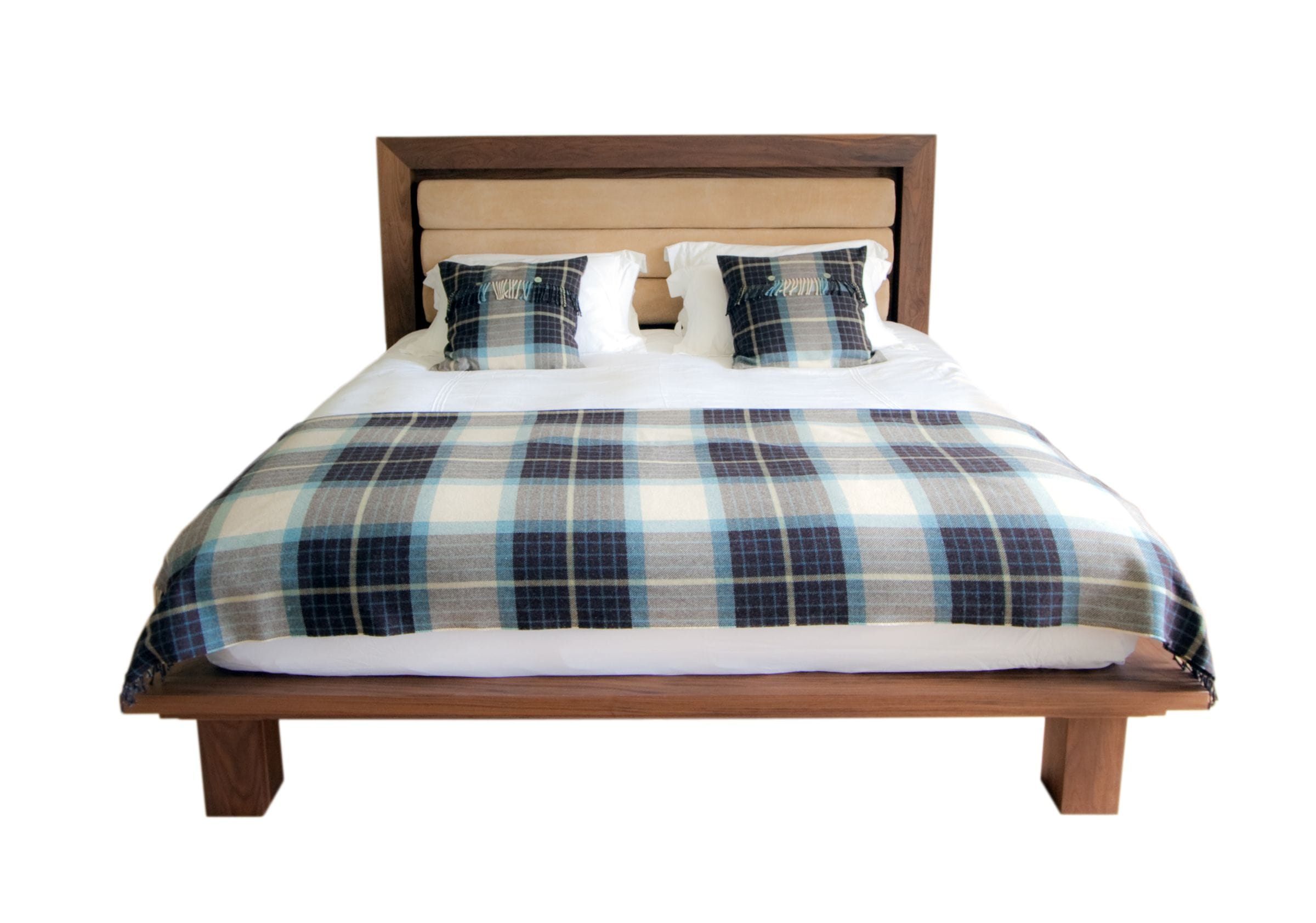 Walnut bed with upholstered headboard dressed in blue tartan bedding