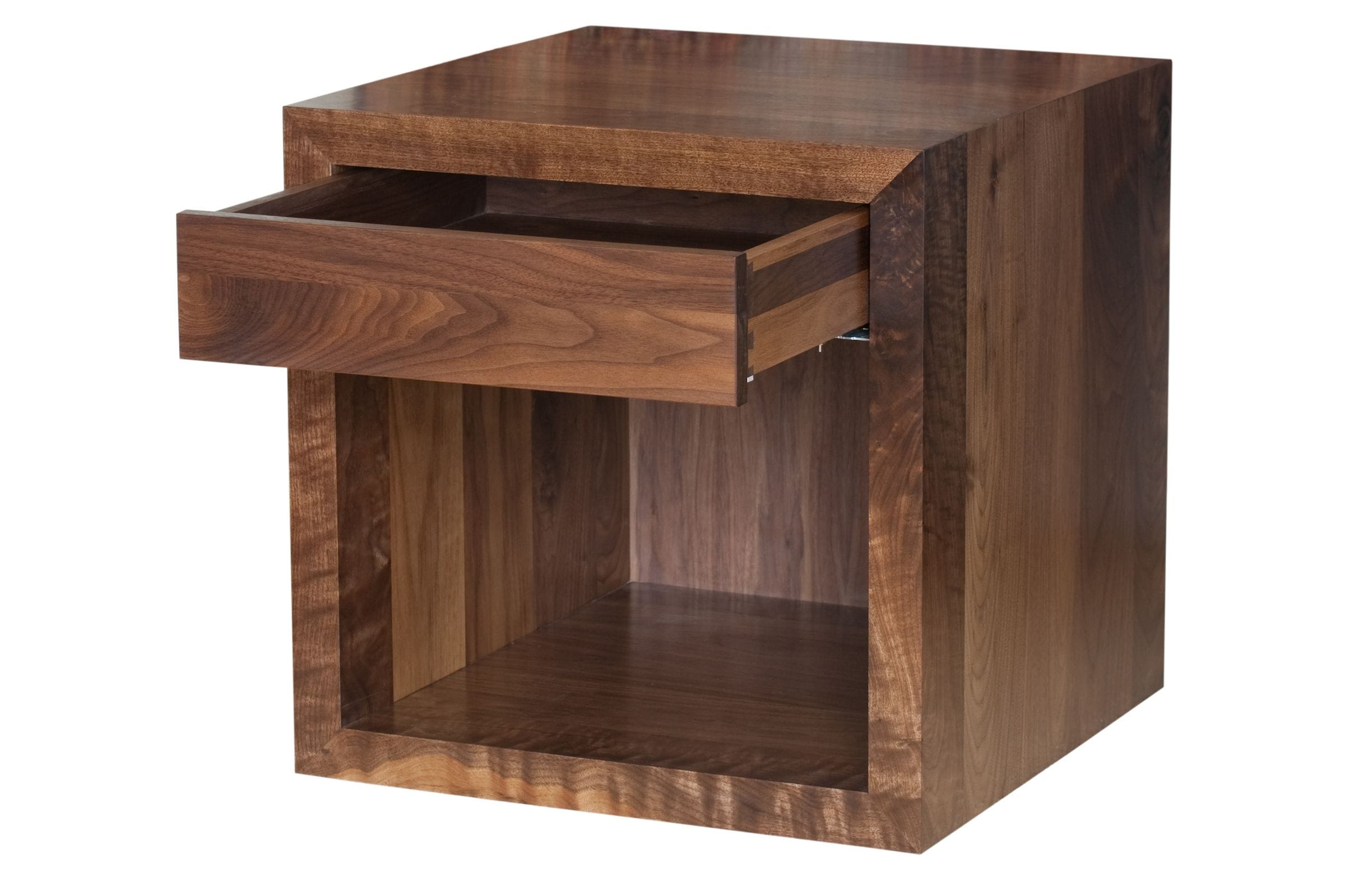 Walnut cube bedside table with its dovetailed drawer pulled open