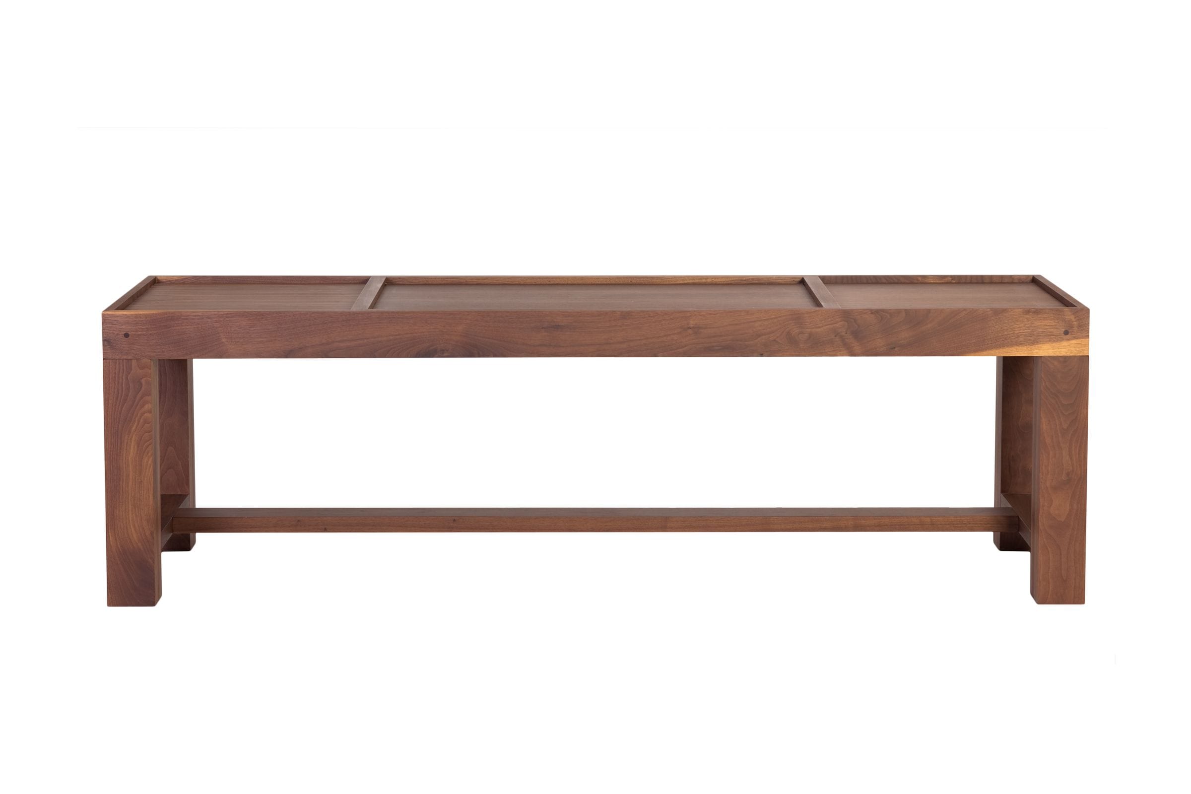 Handmade walnut bench with raised centre panel and stretcher base, front view