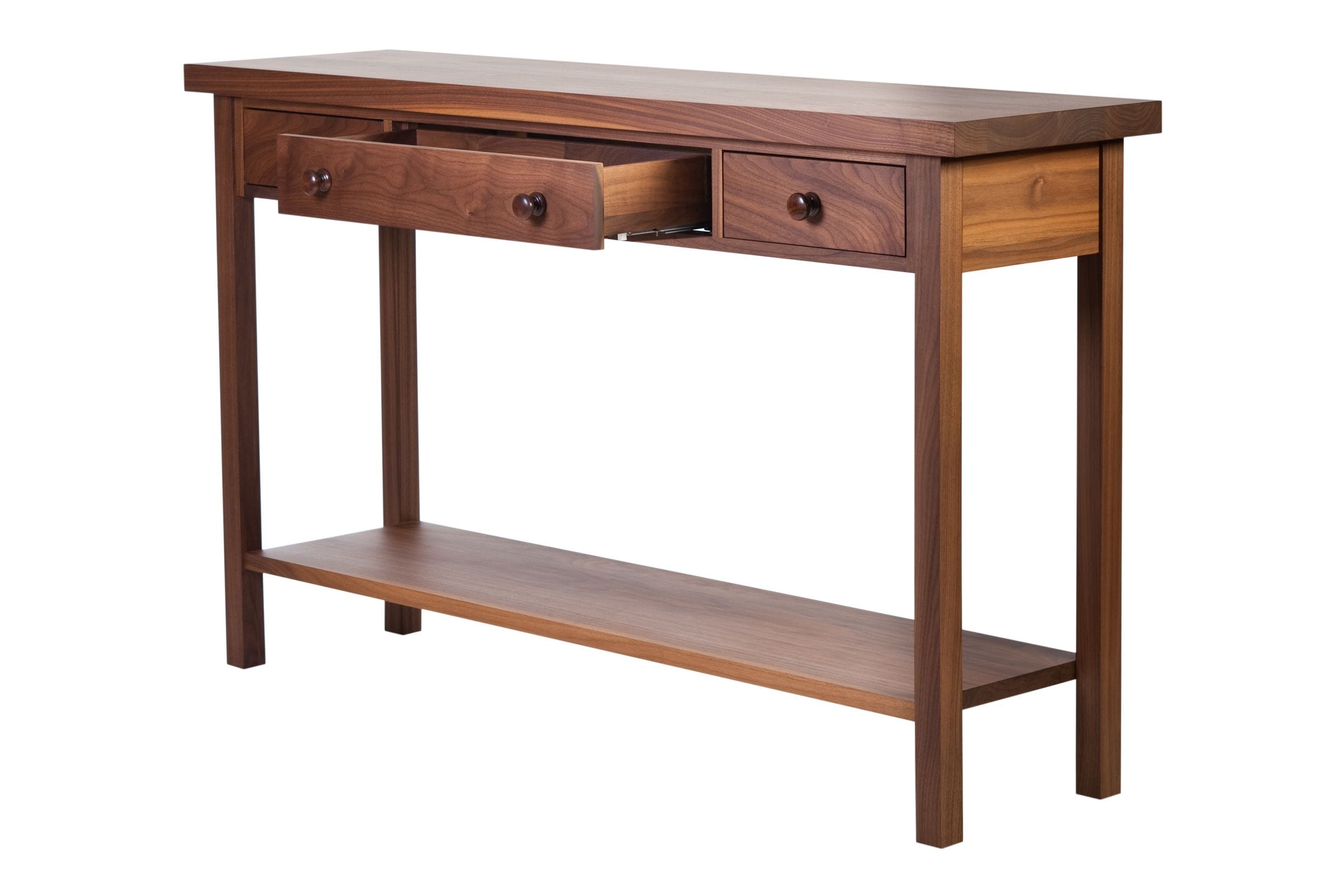Walnut console table with its centre drawer pulled open on runners