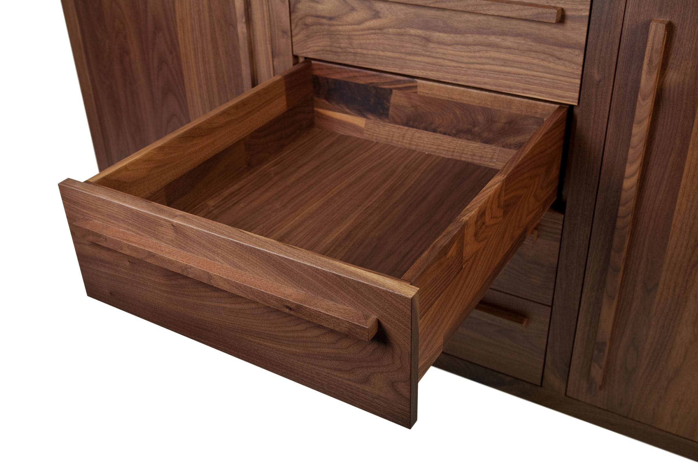 Solid walnut drawer fully extended from a sideboard, showing jointed interior