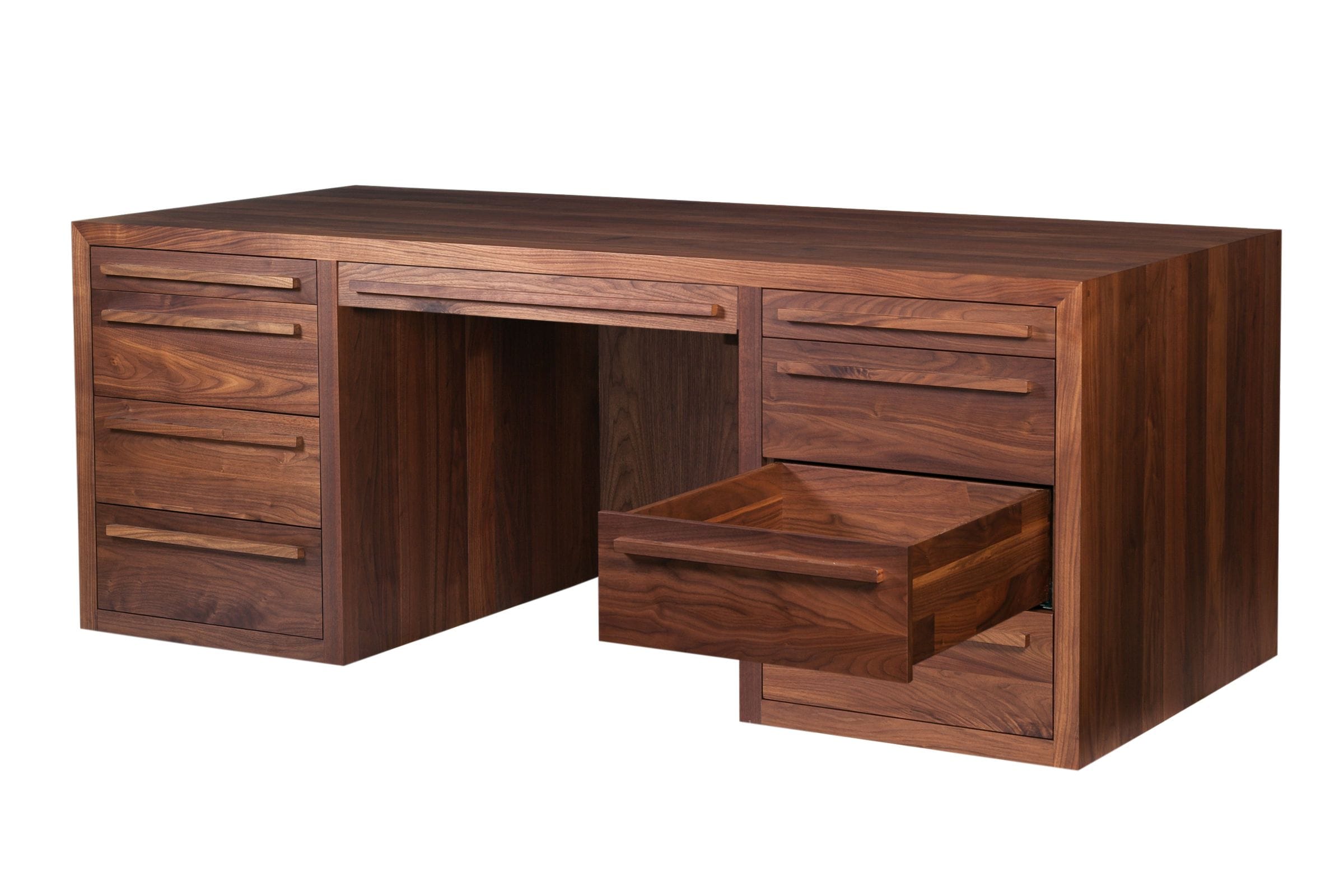 Walnut pedestal desk with one deep drawer pulled open