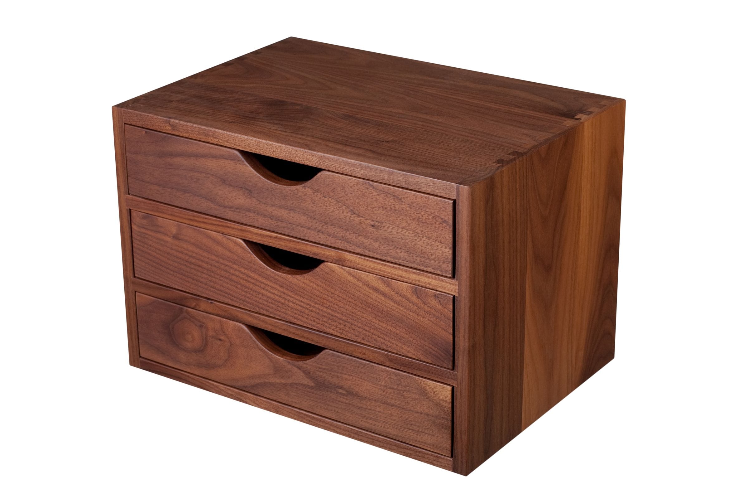 Three-drawer walnut desktop chest with scalloped pulls and dovetailed corners