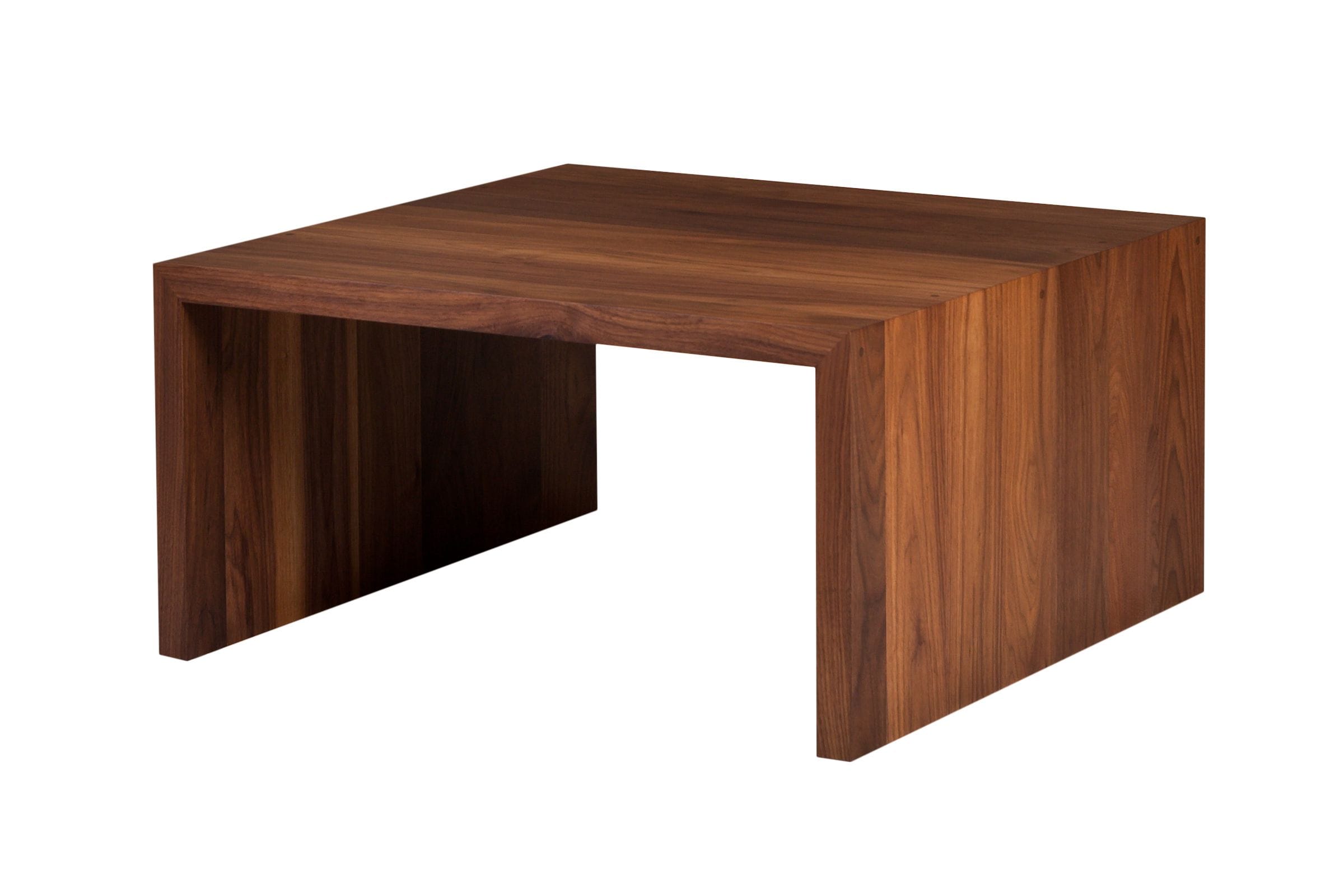 Angled view of a square walnut waterfall coffee table with mitred corners