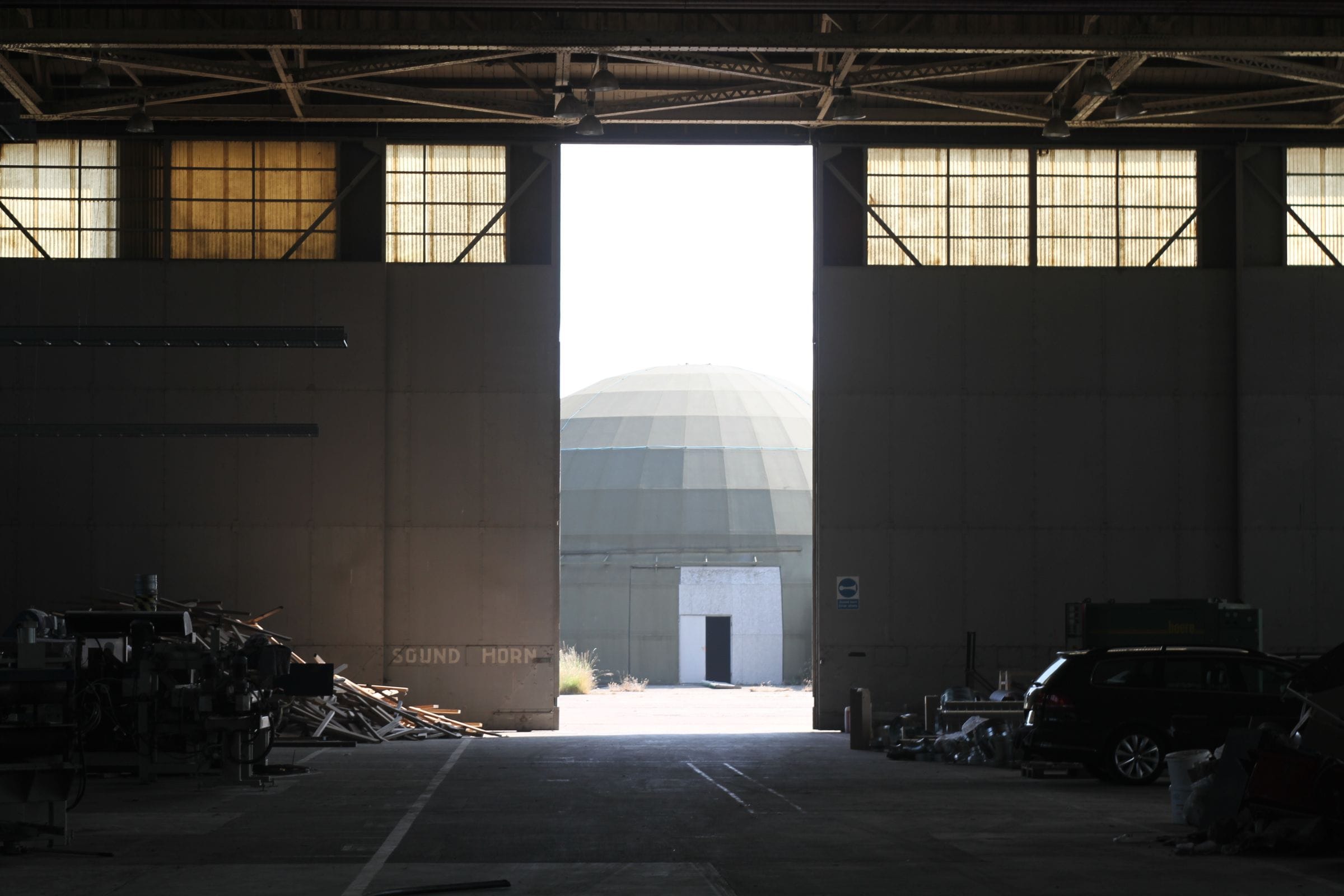 Radar dome seen through the open hangar doors at RAF West Raynham