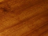 Close-up of warm golden-brown iroko worktop grain