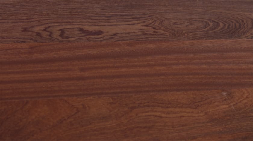 Close-up of sapele worktop surface showing deep red-brown interlocking grain