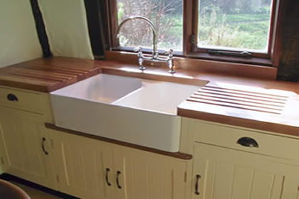 oak traditional plank worktop with drainage grooves