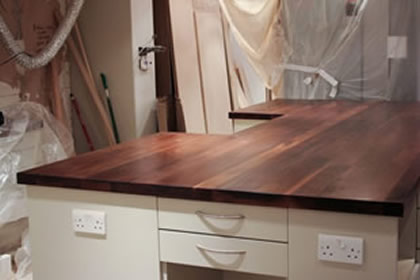 walnut super wide stave worktop with undermount sink cut out