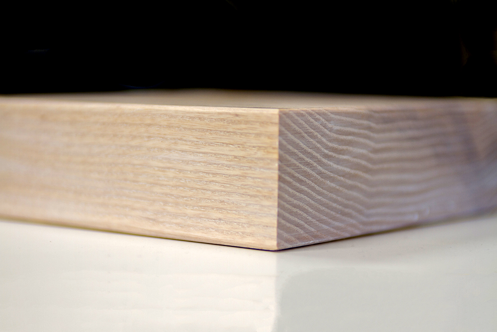 whitewash worktop Corner detail of a limed oak worktop sample showing white-flecked grain