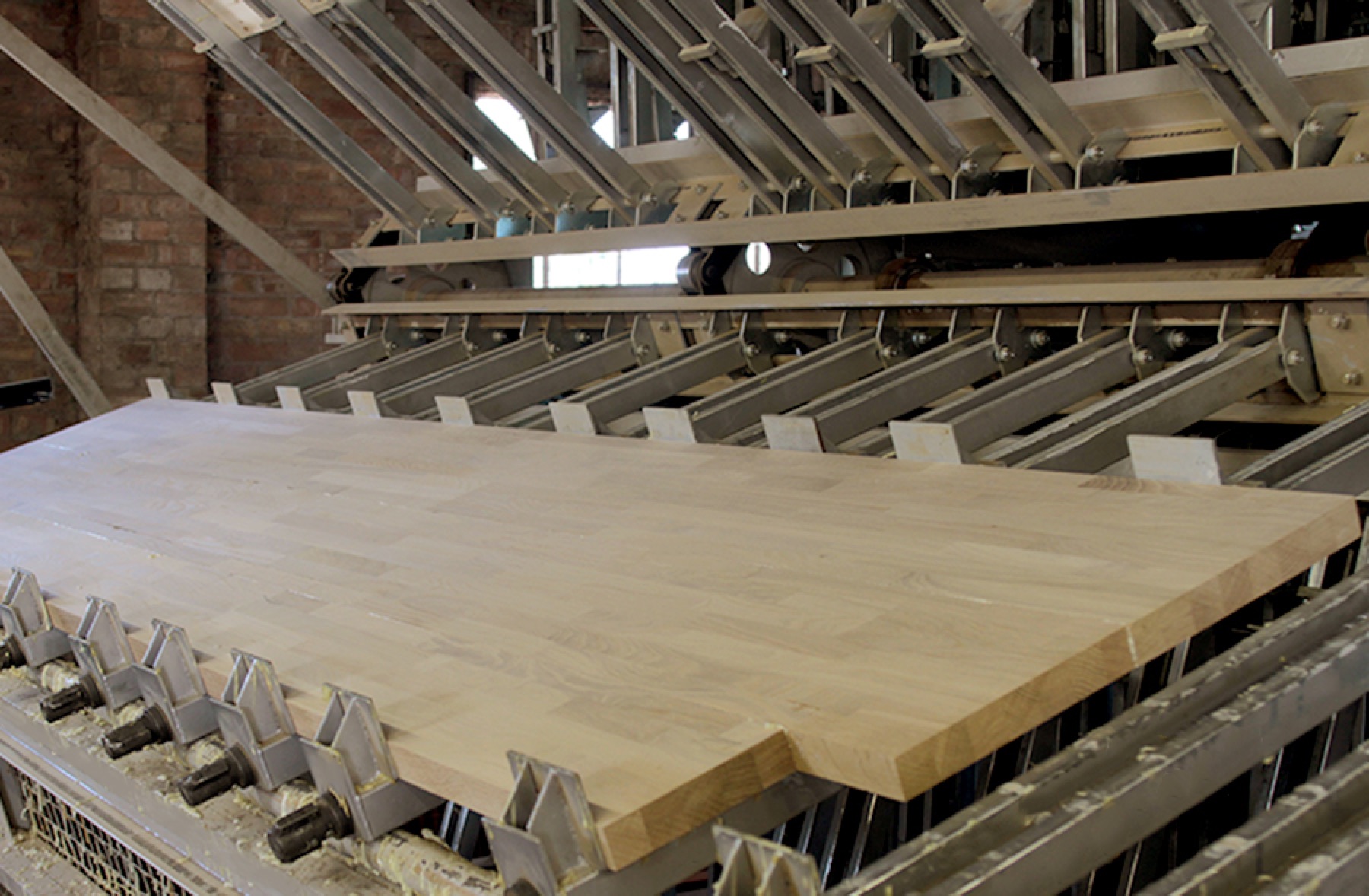 clamped oak worktop Unfinished oak worktop clamped in the bonding press at the Norfolk workshop