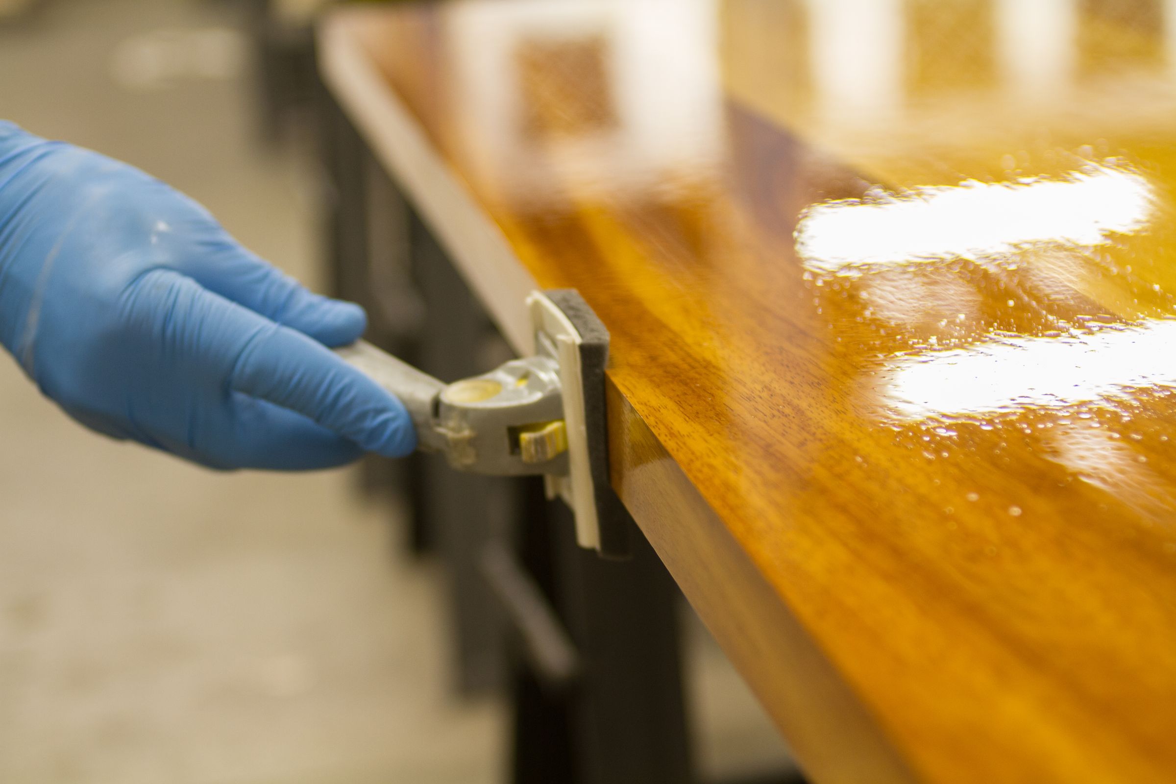 nano-coating an iroko worktop Applying a glossy nano-coat treatment to the edge of an iroko worktop