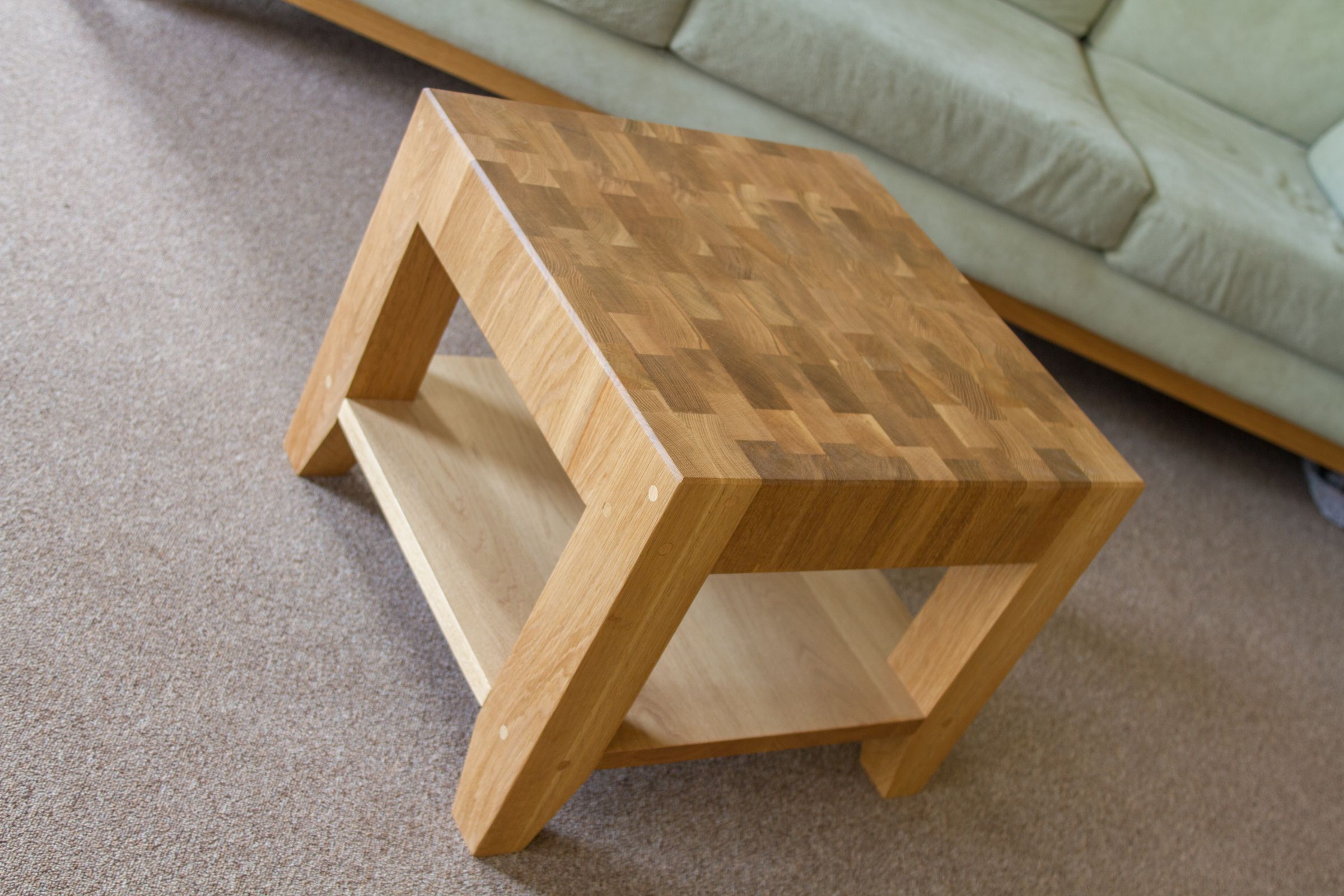 oak end grain coffee table End grain oak coffee table with chequered top and lower magazine shelf